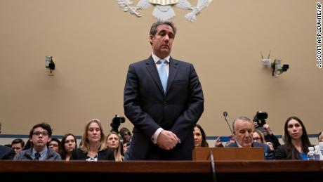 Michael Cohen, President Donald Trump's former personal lawyer, pauses just after being sworn in to testify before the House Oversight and Reform Committee on Capitol Hill in Washington, Wednesday, Feb. 27, 2019. (AP Photo/J. Scott Applewhite)