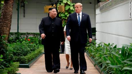 President Donald Trump and North Korean leader Kim Jong Un take a walk after their first meeting at the Sofitel Legend Metropole Hanoi hotel, Thursday, Feb. 28, 2019, in Hanoi. (AP Photo/Evan Vucci)