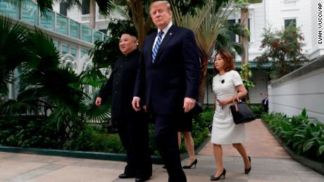 President Donald Trump and North Korean leader Kim Jong Un take a walk after their first meeting at the Sofitel Legend Metropole Hanoi hotel, Thursday, Feb. 28, 2019, in Hanoi. (AP Photo/Evan Vucci)