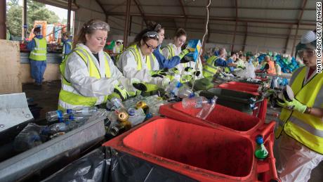 Litter is processed at the Glastonbury Festival&#39;s purpose-built recycling center in June 2017.