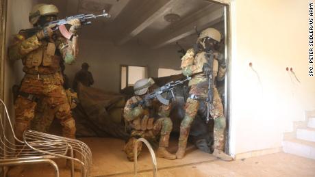 Malian soldiers tactically conduct close combat battle drills in Ouagadougou, Burkina Faso on Feb. 26, 2019. Flintlock is an annual training event where over 25 western and African nations participate in a joint training event. (U.S Army photo by Spc. Peter Seidler)