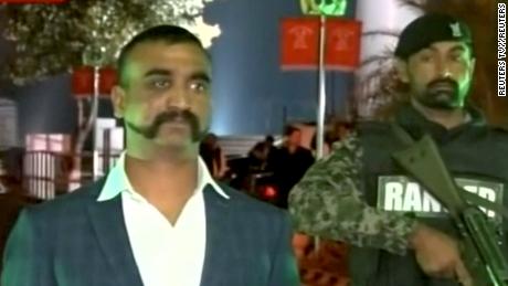 Indian pilot, Wing Commander Abhinandan, stands under armed escort near Pakistan-India border in Wagah, Pakistan on March 1. 