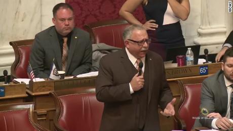 Democratic Delegates Michael Angelucci, left, and Mike Caputo denounced the poster Friday in the West Virginia House.