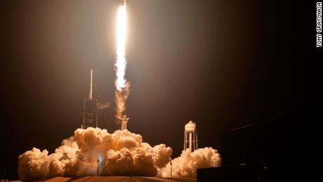 SpaceX Crew Dragon docks with the space station in demo flight