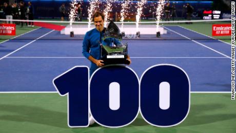 Federer claims 100th title with revenge victory