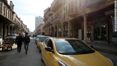 A general view shows traffic on Al-Rashid Street in Baghdad&#39;s historic center on January 21.