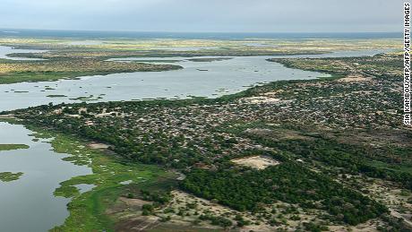 This aerial picture taken on July 16, 2016 shows Lake Chad in Africa's Sahel region. The lake's water supply has shrunk by over 90% since the 1960s. 