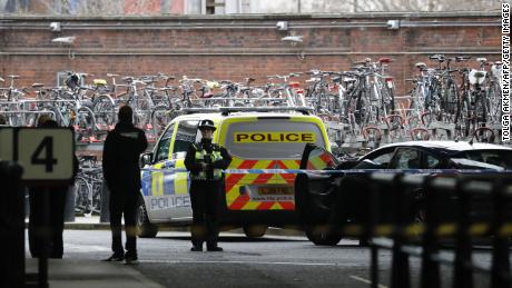 A police-woman stands guard outside a police cordon at Waterloo Station, central London on March 5, 2019, following a report of a suspicious package at the station. - Three small improvised explosive devices were found at buildings at Heathrow Airport, London City Airport and Waterloo train station in what the Metropolitan Police Counter Terrorism Command said was being treated as a &quot;linked series&quot;. (Photo by Tolga AKMEN / AFP)        (Photo credit should read TOLGA AKMEN/AFP/Getty Images)