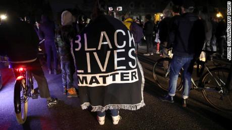 Black Lives Matter protesters march through the streets on March 4, 2019 in a demonstration against the decision by Sacramento's District Attorney to not charge the police officers who shot and killed Stephon Clark last year.