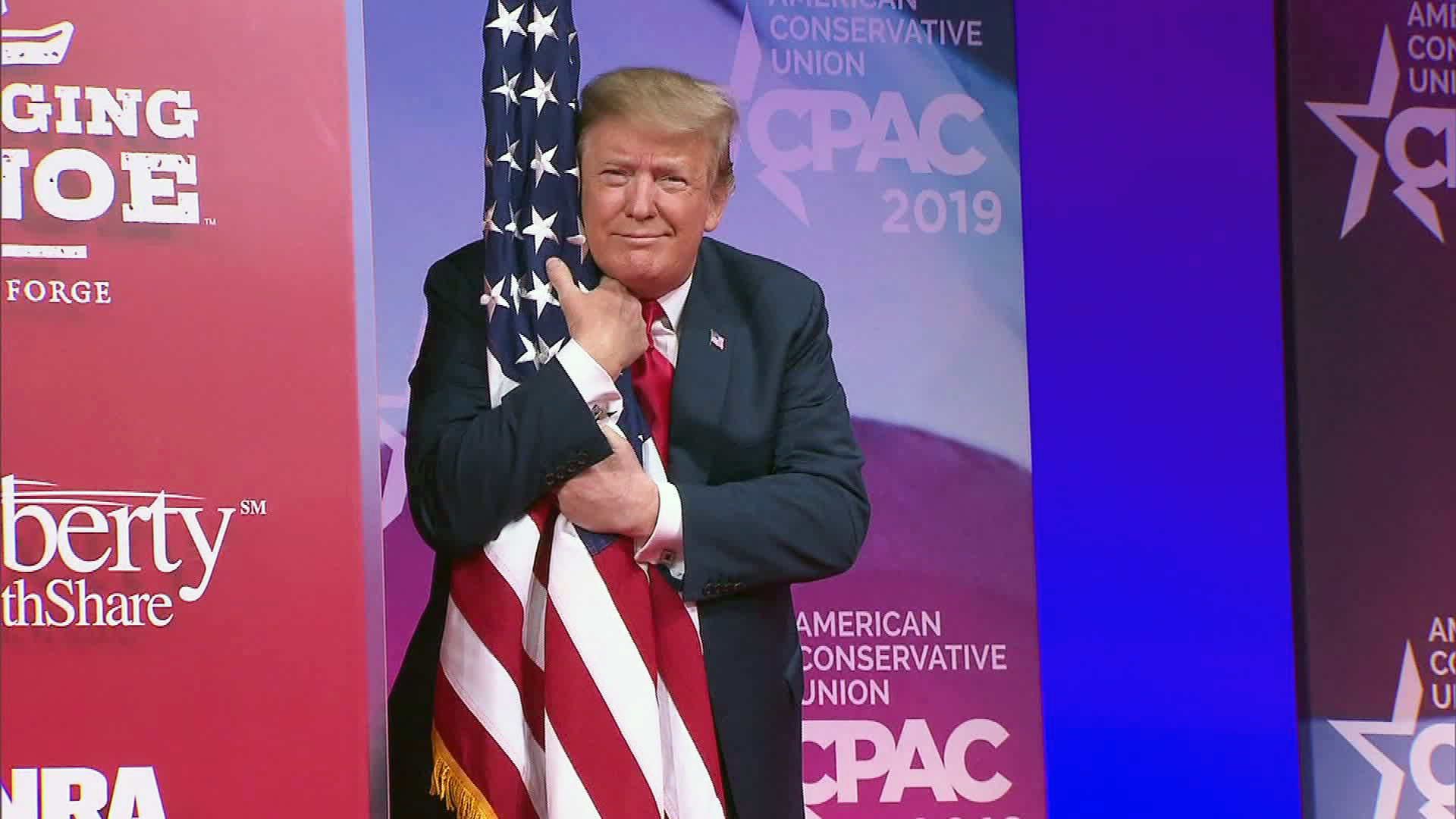 American conservative. Дональд Трамп в один дома. Trump hugs Flag. Trump Flag hugging. Один дома Дональд Трамп отрывок.