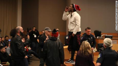 Activists disrupt the Sacramento city council meeting. 