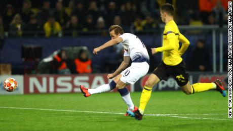 Harry Kane fires home his side's winning goal in Dortmund.