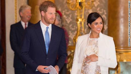 Harry and Meghan attend a reception for the Prince of Wales at Buckingham Palace on March 5, 2019.