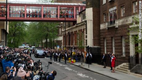 Crowds greet Prince William and the Duchess of Cambridge at the Lindo Wing of St. Mary&#39;s Hospital.