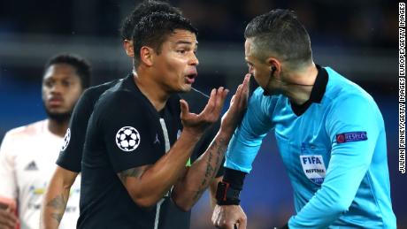 Thiago Silva of PSG remonstrates with the referee after a penalty is awarded to Manchester United.