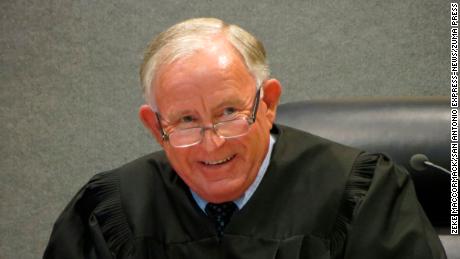 State District Judge Jack Robison said he expects his ruling to be appealed, whether he grants or denies a defense motion seeking dismissal of the charge against Justin Carter.