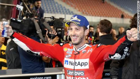 Dovizioso celebrates following his 0.023-second triumph.