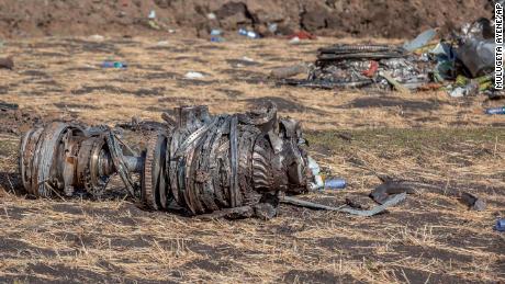 Airplane parts lie on the ground at the scene of the Ethiopian Airlines crash on Monday.