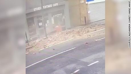 Bricks crashed onto the pavement in Stoke Newington High Street moments after a man walked by. 