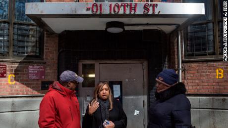 Patton leads a walking tour of Queensbridge Houses in New York. 