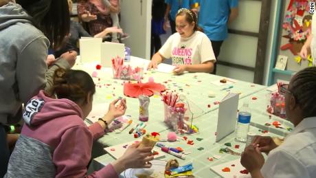 Ananda, 12, completes an art project as part of a program that lets her visit at a museum with her mother, who is incarcerated. 