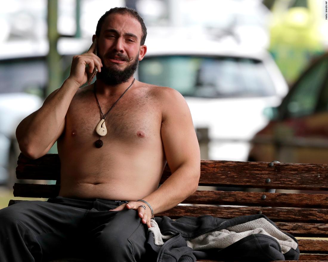 A man reacts as he speaks on a cell phone near one of the mosques. The two mosques targeted were the al Noor mosque on Deans Avenue and the Linwood mosque on Linwood Avenue.