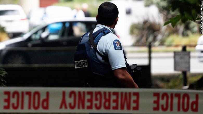 A police officer secures the area in front of the Masjid al Noor mosque after a shooting incident in Christchurch on March 15, 2019. - Attacks on two Christchurch mosques left at least 49 dead on March 15, with one gunman -- identified as an Australian extremist -- apparently livestreaming the assault that triggered the lockdown of the New Zealand city. (Photo by Tessa BURROWS / AFP)        (Photo credit should read TESSA BURROWS/AFP/Getty Images)