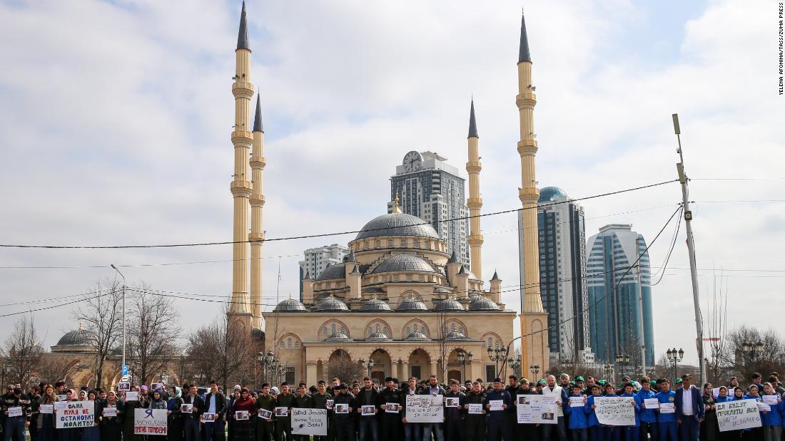 People take part in a memorial to the Christchurch victims in central Grozny, in the Russian region of Chechnya.