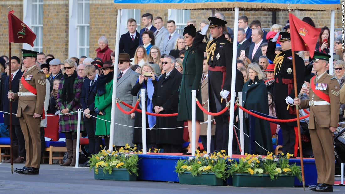 Catherine, Duchess of Cambridge, and Prince William, Duke of Cambridge, observe a moment of silence for the victims of the attacks in Christchurch during the 1st Battalion Irish Guards St. Patrick's Day Parade at Cavalry Barracks on March 17.