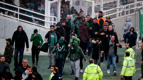 Olympiakos, who led 1-0 at the time of the game being officially called off, has been handed the victory. Panathinaikos could face both a fine and points deduction due to the behavior of the club&#39;s fans.