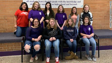 Students at Swan Valley Middle School in Saginaw, Michigan, after donating much of their hair to charity. 