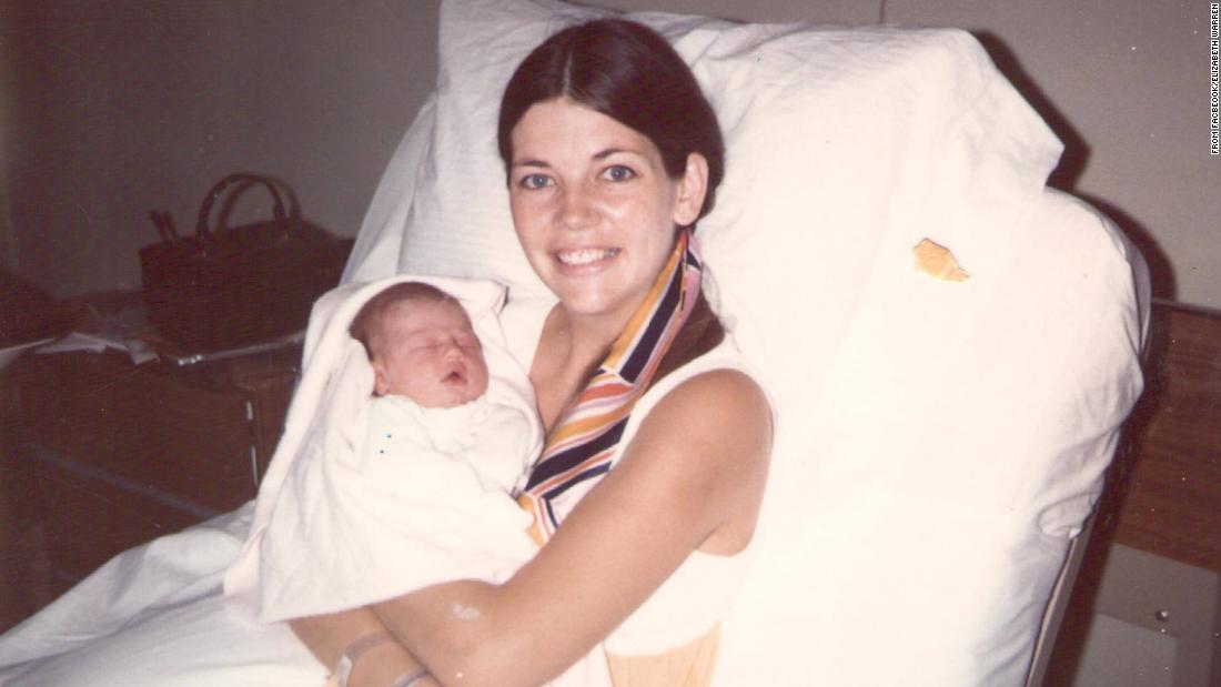 Warren holds her newborn daughter, Amelia, in 1971. She and her first husband, Jim Warren, had two children before divorcing in 1980.