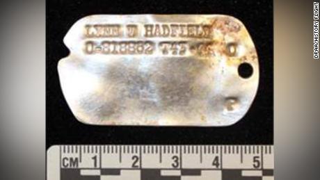 An ID tag was among personal items found by researchers. 