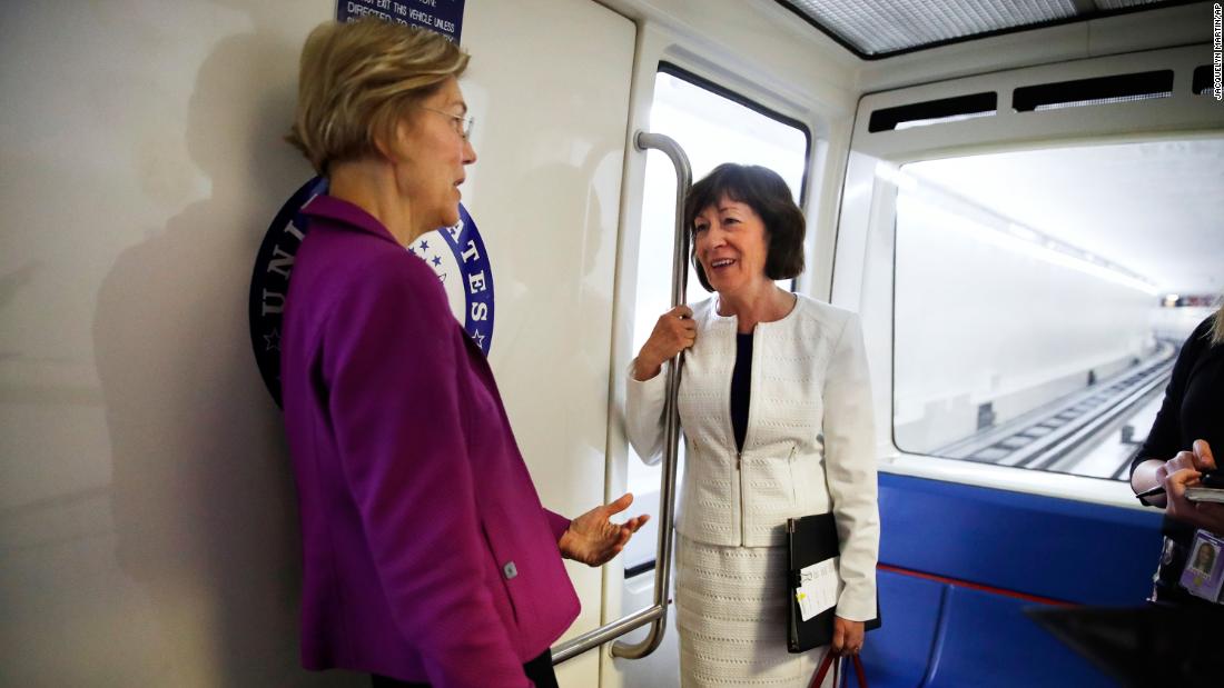 Warren and US Sen. Susan Collins ride the Senate subway in June 2018.