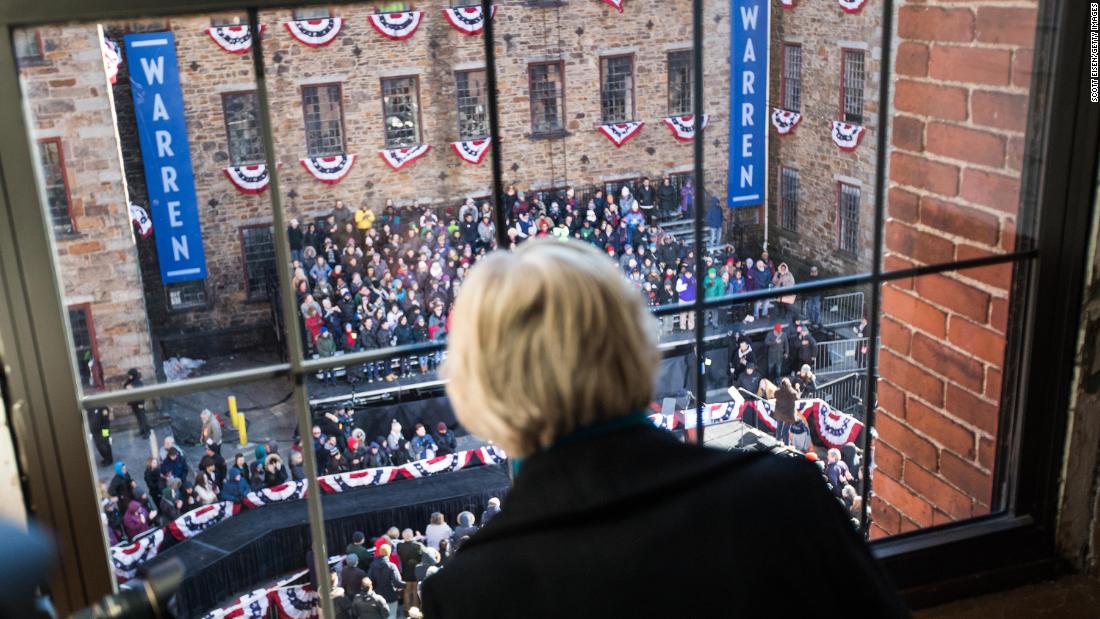 Warren looks down at the crowd in Lawrence, Massachusetts, before formally announcing her presidential bid in February 2019.