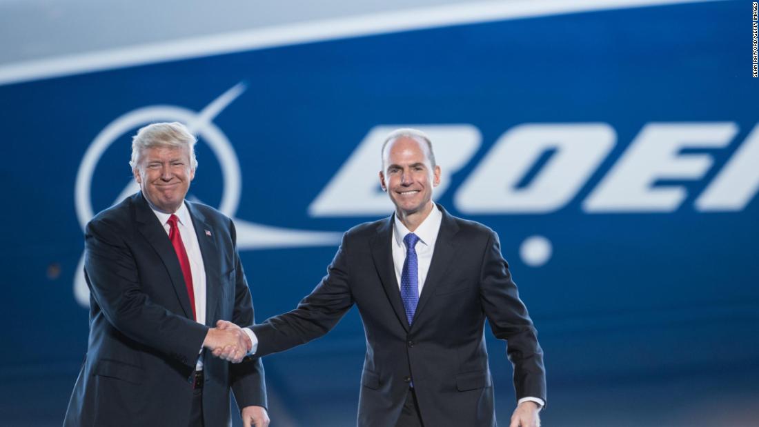 Boeing CEO Dennis Muilenburg shakes hands with President Donald Trump at the 787 kickoff event in 2017.