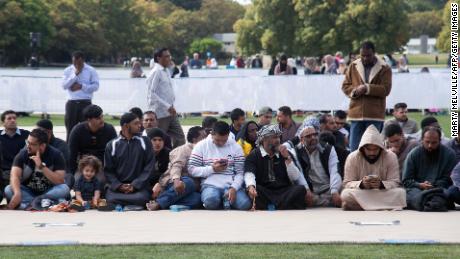 Members of the Muslim community gather for congregational Friday prayers and a two-minute observation of silence at Hagley Park.