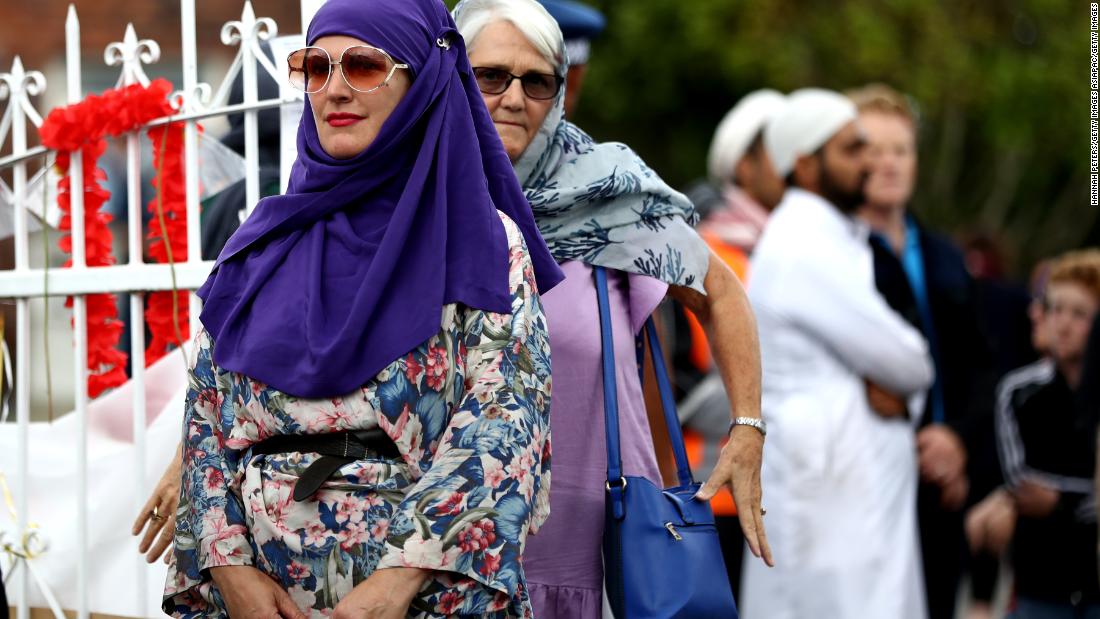 People gather at the Ponsonby Masjid Mosque during an open service to all religions Friday in Auckland, New Zealand.