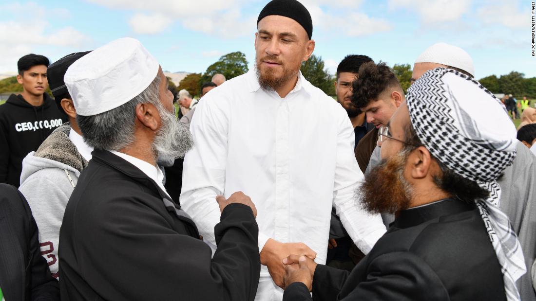  New Zealand All Blacks rugby player Sonny Bill Williams greets members of the Muslim community after attending Friday prayers near Al Noor mosque in Christchurch, New Zealand.