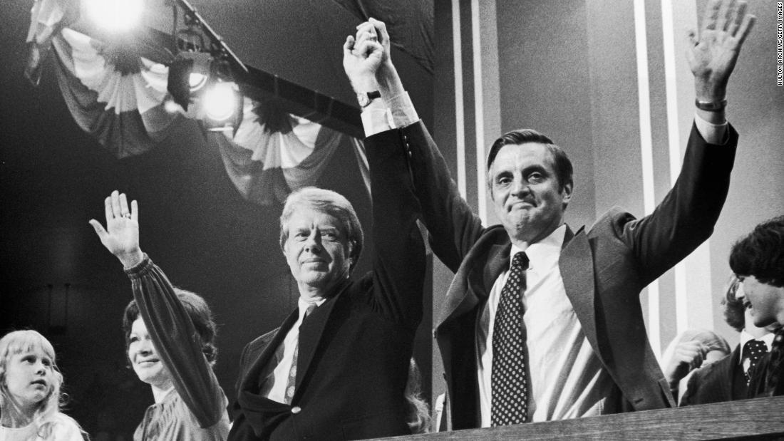After becoming the Democratic Party&#39;s presidential nominee in 1976, Carter raises hands with running mate Walter Mondale at the Democratic National Convention in New York. Standing to Carter&#39;s right is his wife, Rosalynn, and their daughter, Amy. Carter ran as a Washington outsider and someone who promised to shake up government.