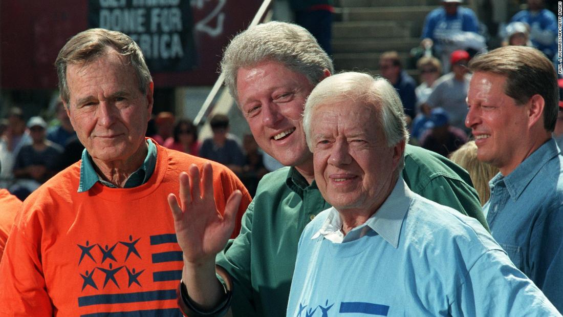 From left, former President George H.W. Bush, President Bill Clinton, Carter and Vice President Al Gore attend the Presidents&#39; Summit for America&#39;s Future in Philadelphia in 1997. They helped clean up local neighborhoods as part of the effort to encourage volunteer service.