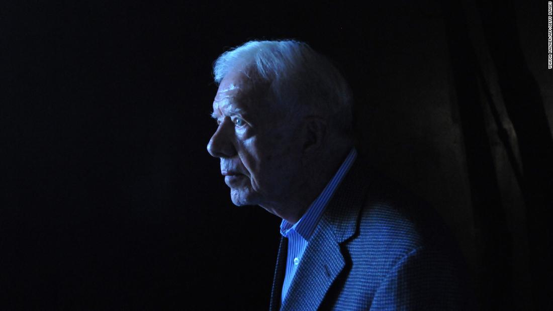 Carter walks out of the Hall of Remembrance at the Yad Vashem Holocaust memorial in Jerusalem in August 2009. The Elders, an independent council of retired world figures, kicked off a visit to Israel and the Palestinian territories in a bid to encourage Middle East peace efforts.