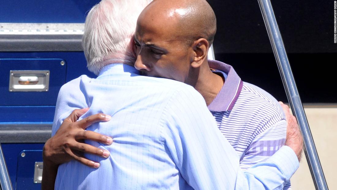Carter hugs Aijalon Mahli Gomes at Boston&#39;s Logan International Airport in August 2010. Carter negotiated Gomes&#39; release after he was held in North Korea for crossing into the country illegally in January 2010.