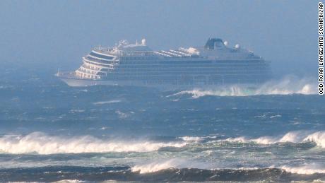 The cruise ship Viking Sky as it drifts after sending a Mayday signal because of engine failure in windy conditions near Hustadvika, off the west coast of Norway, Saturday March 23, 2019. The Viking Sky is forced to evacuate its estimated 1,300 passengers. (Odd Roar Lange / NTB scanpix via AP)