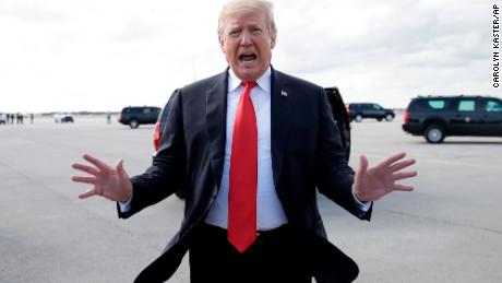 President Donald Trump talks to the media before boarding Air Force One, Sunday, March 24, 2019, at Palm Beach International Airport, in West Palm Beach, Fla., en route to Washington. (AP Photo/Carolyn Kaster)