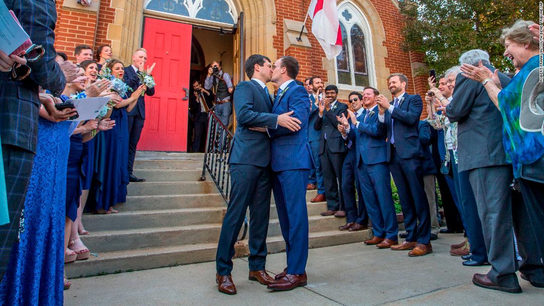 Buttigieg kisses his husband, Chasten, after they were married in South Bend in June 2018.