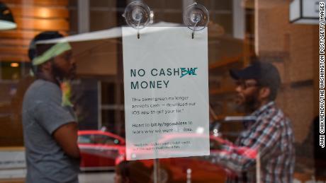 Opponents argue that cashless stores like Sweetgreen exclude low-income residents without credit cards or bank accounts. 