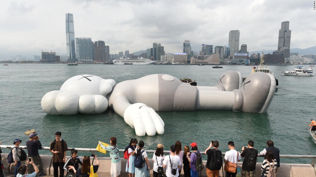 Giant Kaws Sculpture Appears On Hong Kong Waters Cnn Style 