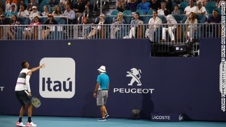 Nick Kyrgios taunts a heckling spectator at the Miami Open by throwing a ball to the stands 