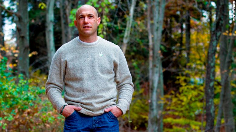 Jeremy Richman stands the backyard of his home in 2013. His daughter Avielle was killed in the 2012 Sandy Hook school shooting.